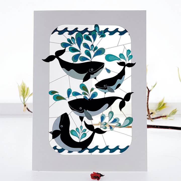 Four Whales Splashing